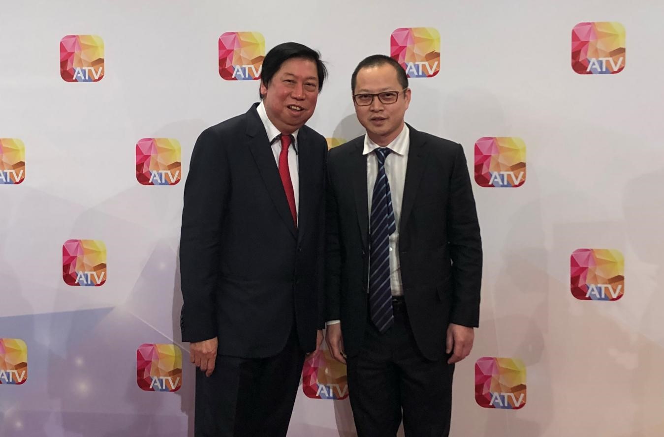 亚视行政总裁吴雨与尊龙凯时总裁李波